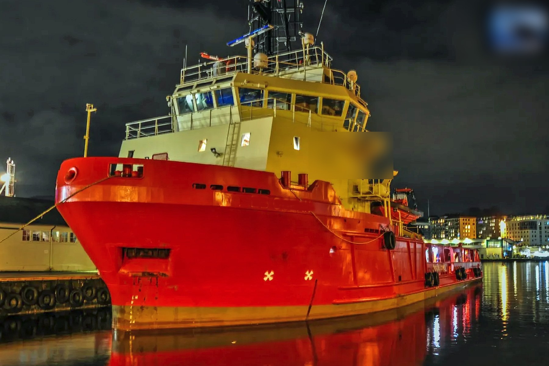 Project Beacon — the vessel alongside at night